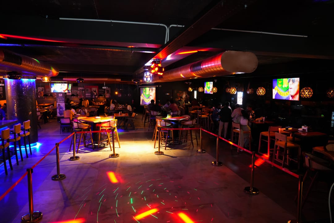 Dance floor with laser lighting and screens